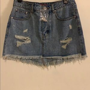CAFFEINE blue torn jean skirt size M.